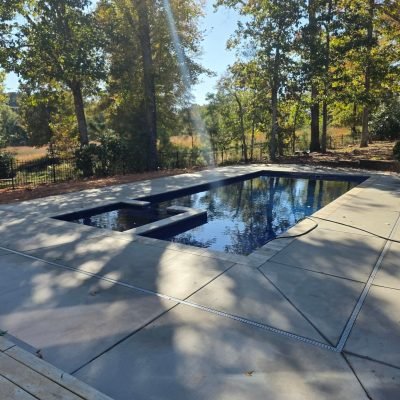 Concrete vs Pavers: Which Works Best for Your Pool Area?